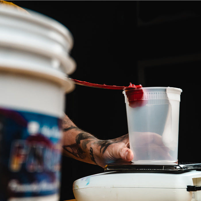 FN-INK Red being added to a container with FN-INK White ink