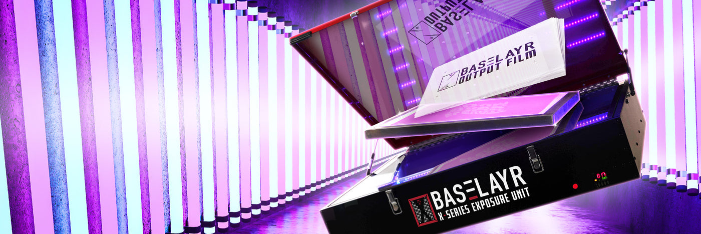 Baselayr X-Series Exposure Unit with purple and pink LED lights in a futuristic setting. The unit is open, revealing Baselayr output film and a screen. Vertical neon lights in purple and blue create a high-tech, vibrant background, highlighting the sleek design of the exposure unit.